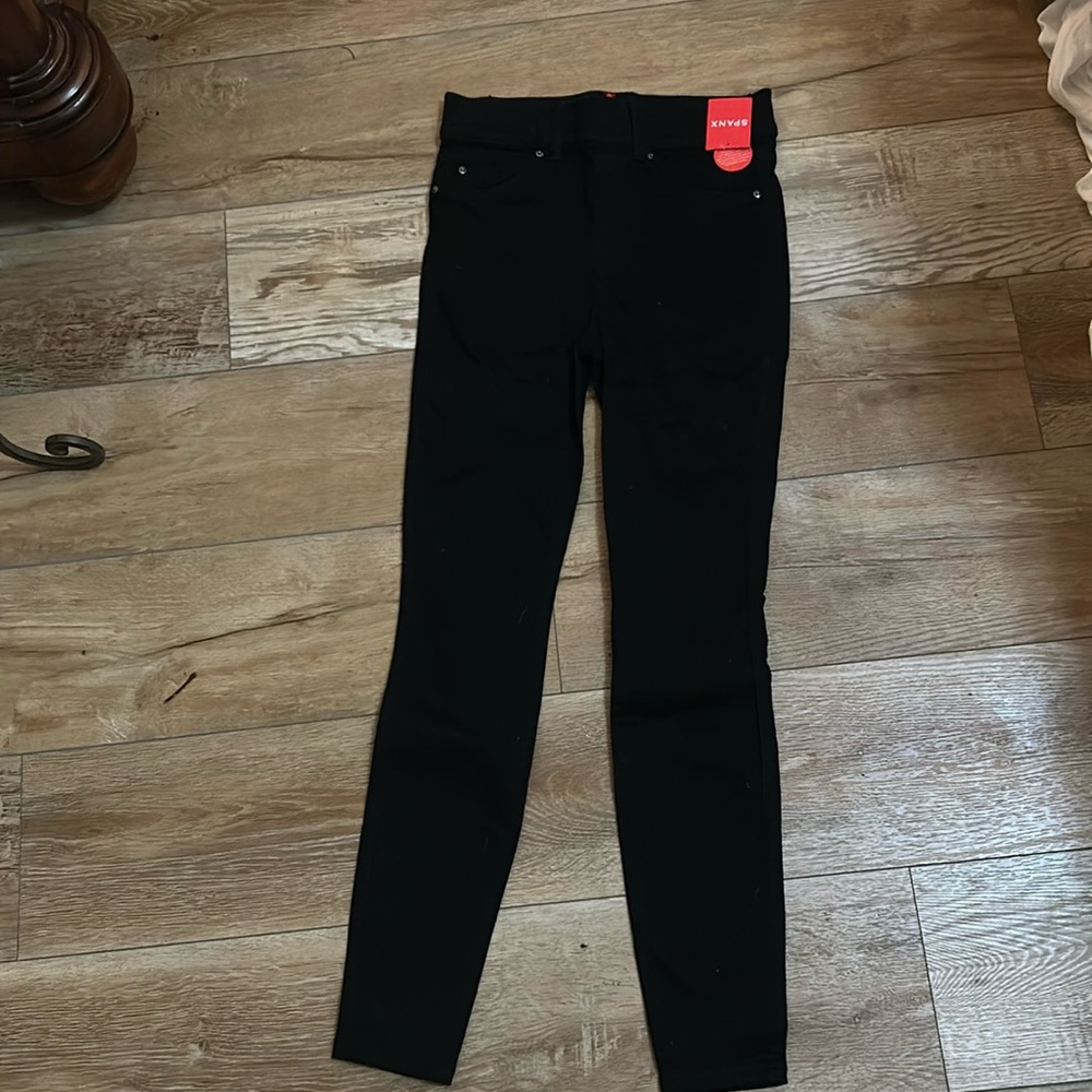 NWT SPANX Black Skinny Jean. Size XS regular.